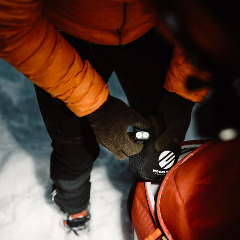 Person packing a Moonlight Headlamp