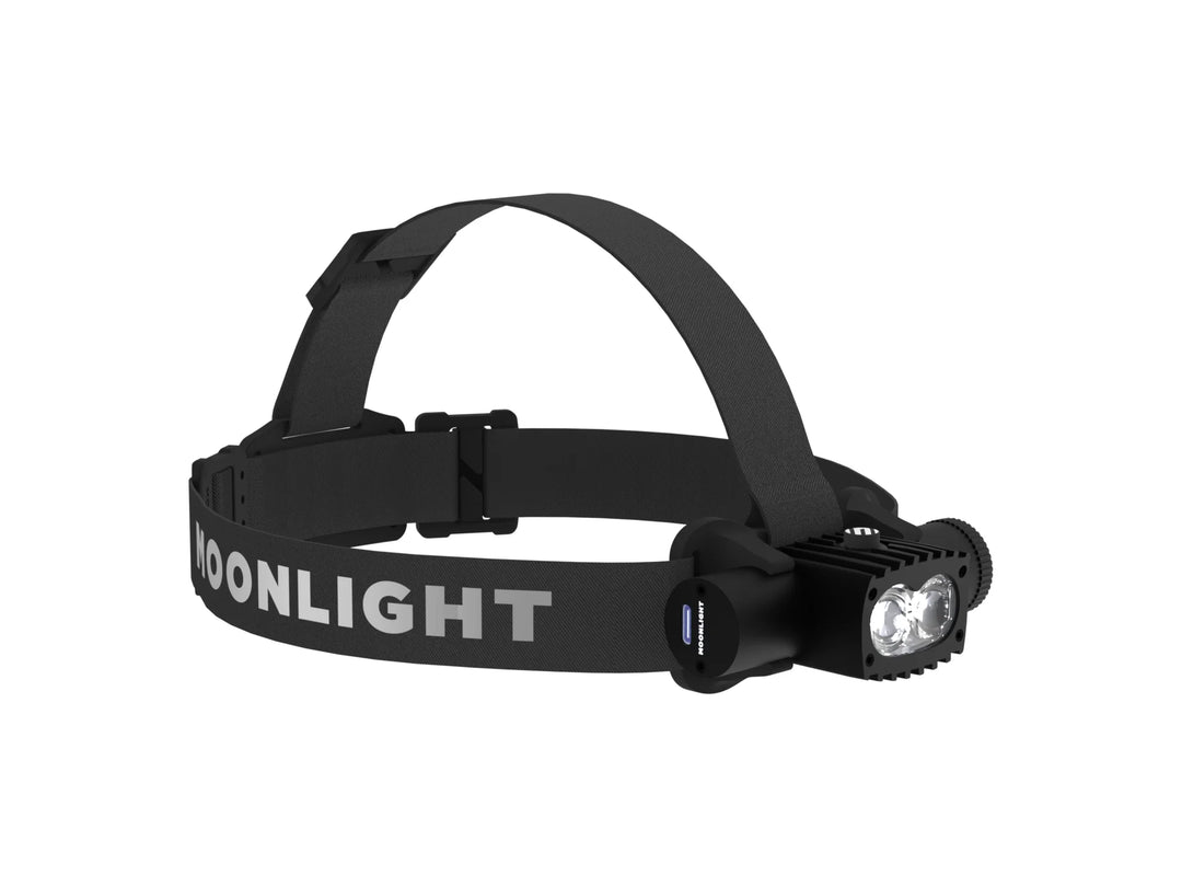 Moonlight Noctia Max headlamp on a white background, perspective view, slate-grey aluminum casing with extended top strap